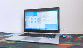 photo of a 2017 HP Elitebook x360 1030 G2 running Fedora Linux with the Gnome desktop environment