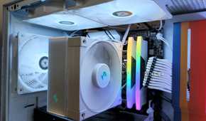 Close up of the ARGB fans and CPU cooler inside an NZXT H5 Flow Starfield gaming PC case