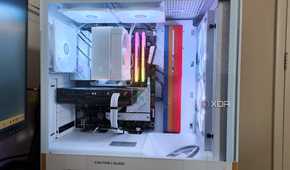 An NZXT H5 Flow Starfield gaming PC case with complete backlit build inside seen from the side