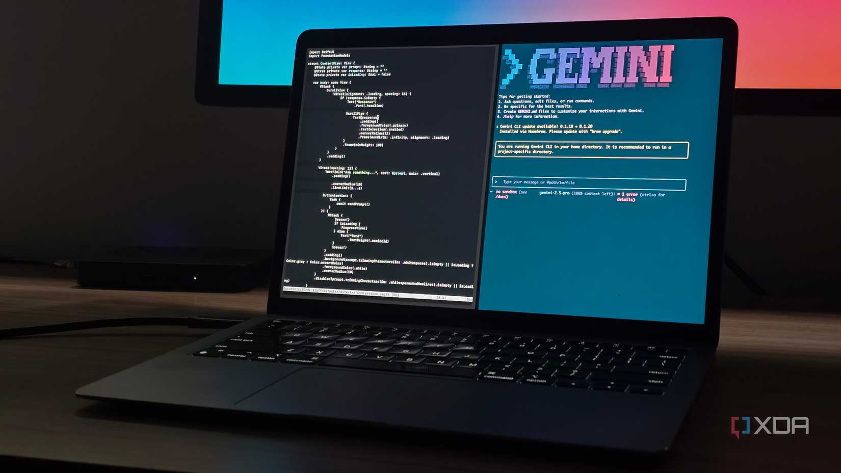 MacBook connected to a monitor with 2 terminal windows open