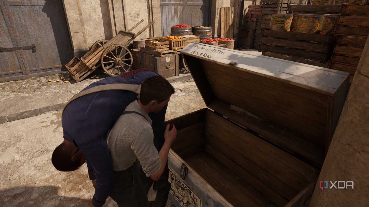 Enzo hiding a corpse in a box in Mafia: The Old Country.