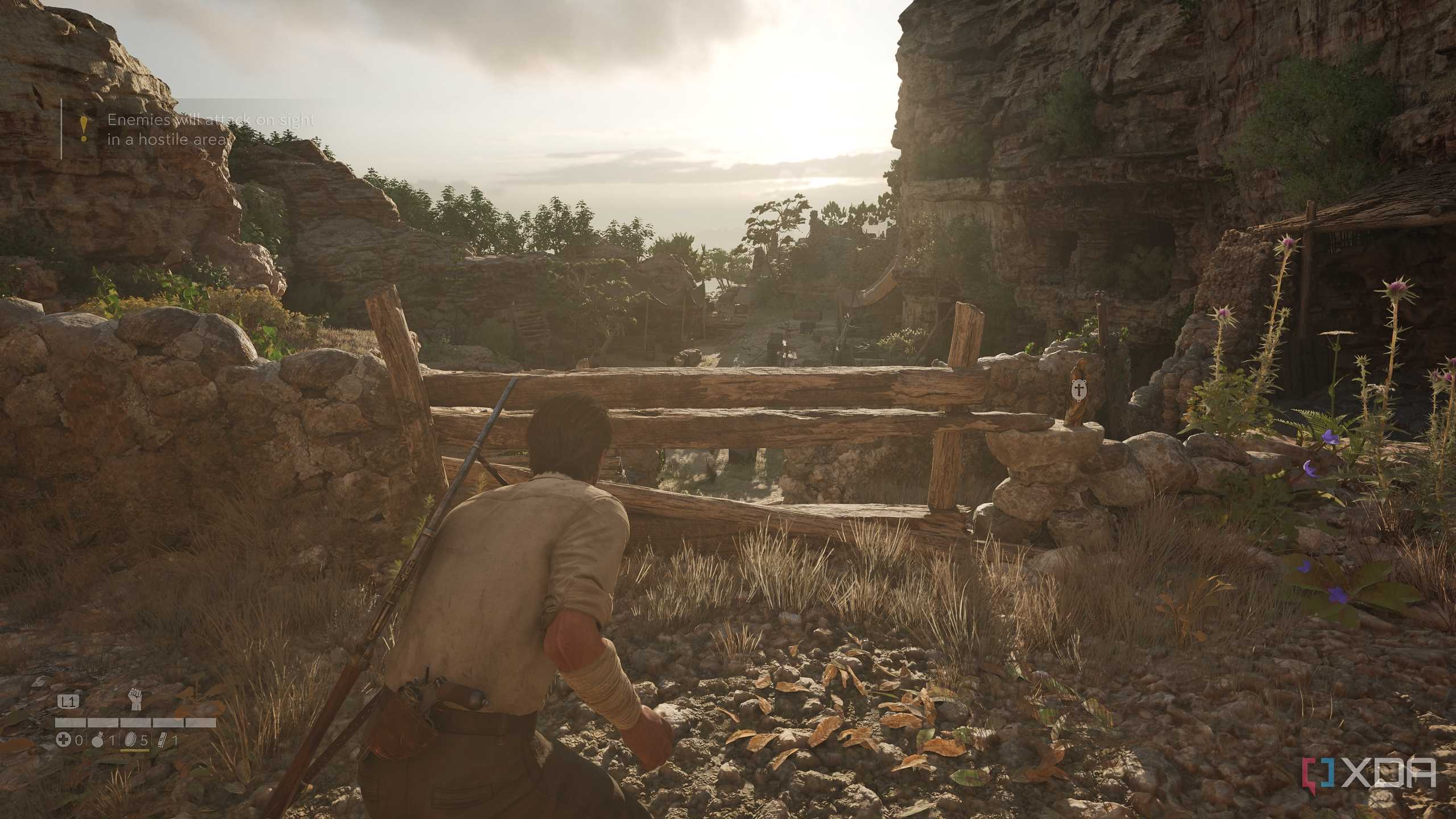 Enzo sneaking in a bandit camp in Mafia: The Old Country.