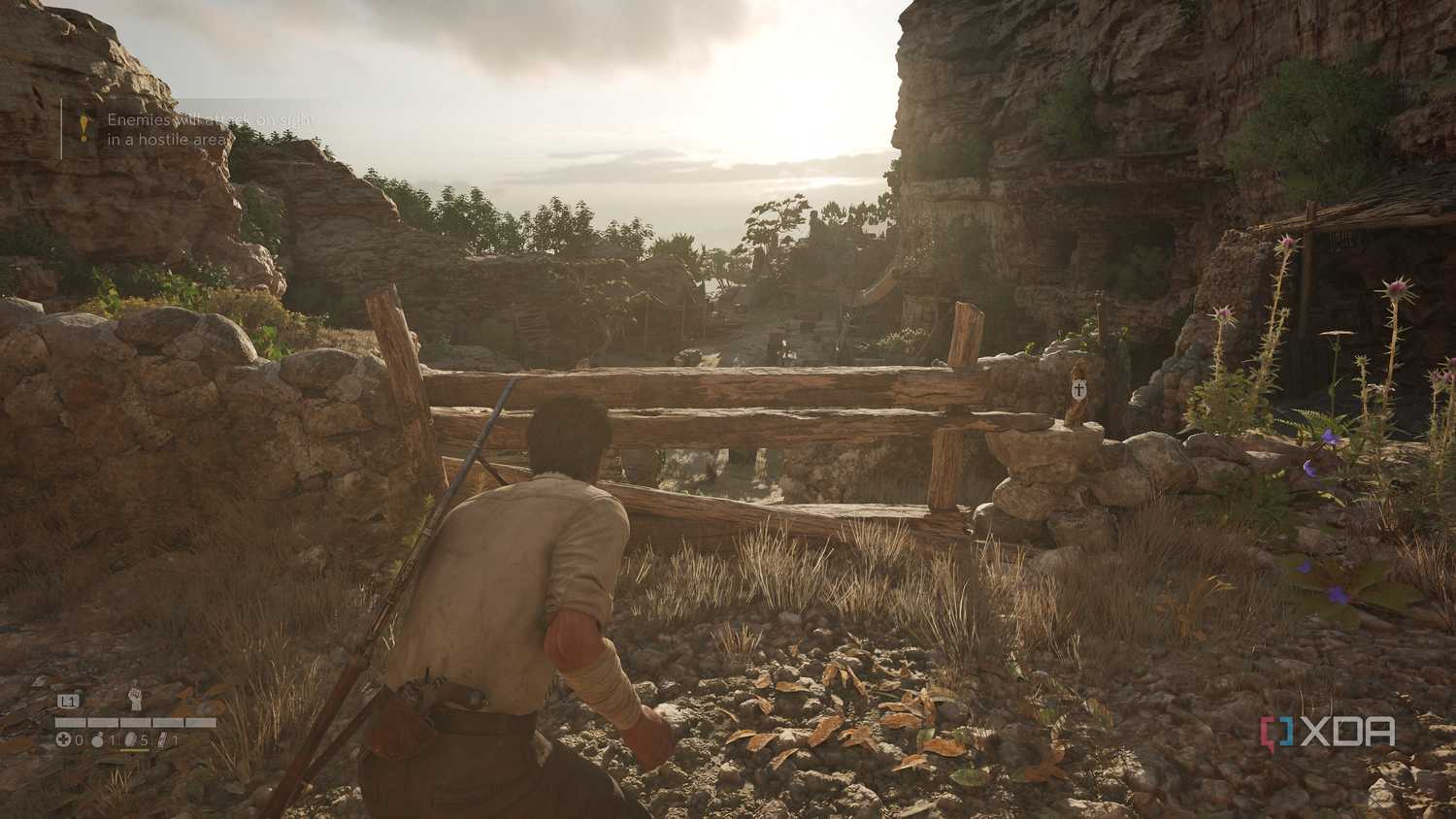 Enzo sneaking in a bandit camp in Mafia: The Old Country.