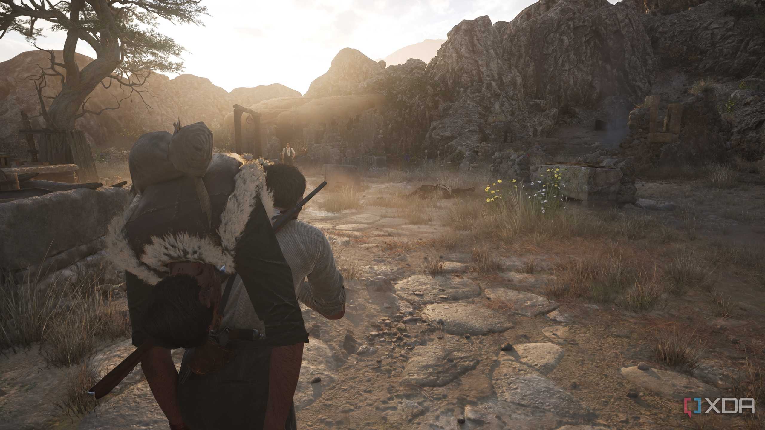 Enzo carrying a corpse towards Cesare in Mafia: The Old Country.
