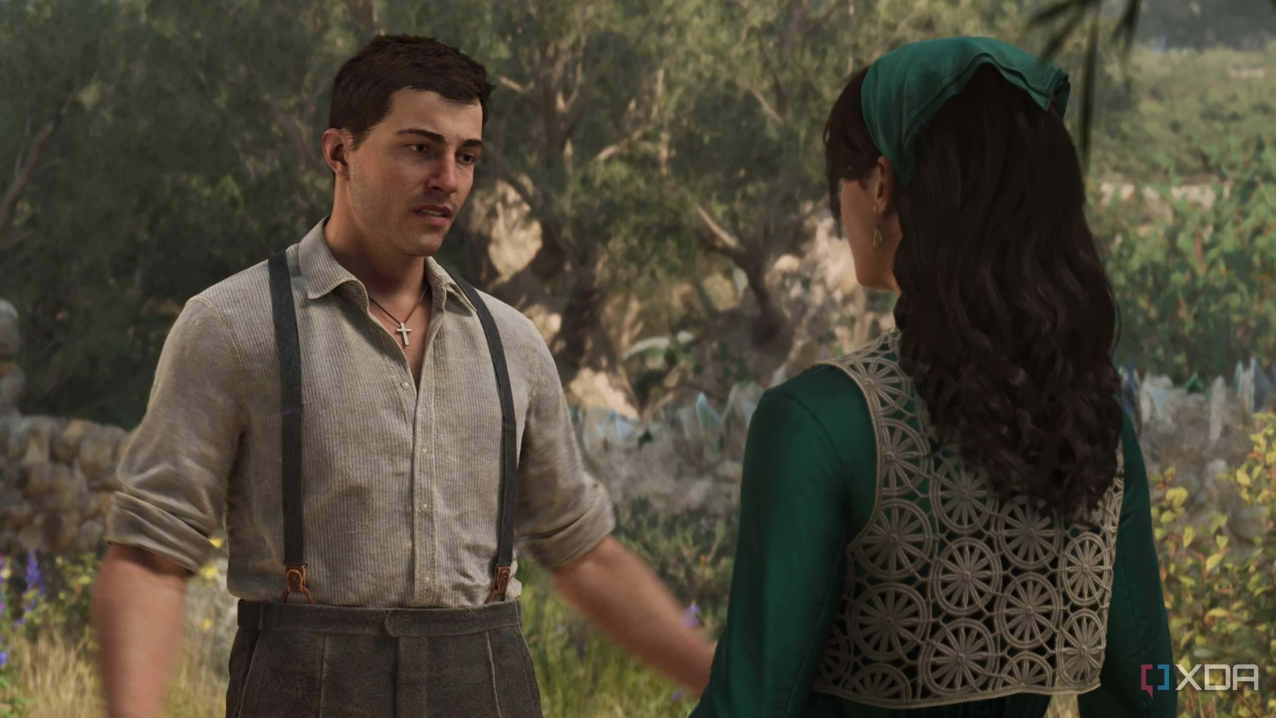 Enzo and Isabella talking in a lawn in Mafia: The Old Country.