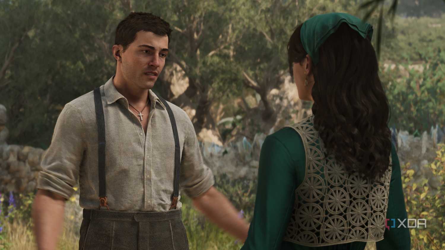 Enzo and Isabella talking in a lawn in Mafia: The Old Country.