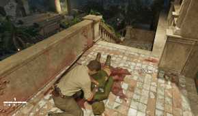 Enzo looting a corpse in Mafia: The Old Country.