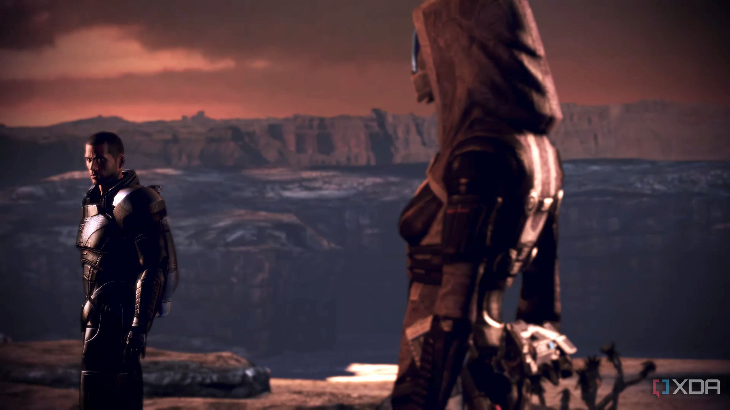 Commander Shepard looking at Tali'Zorah in Mass Effect 3.