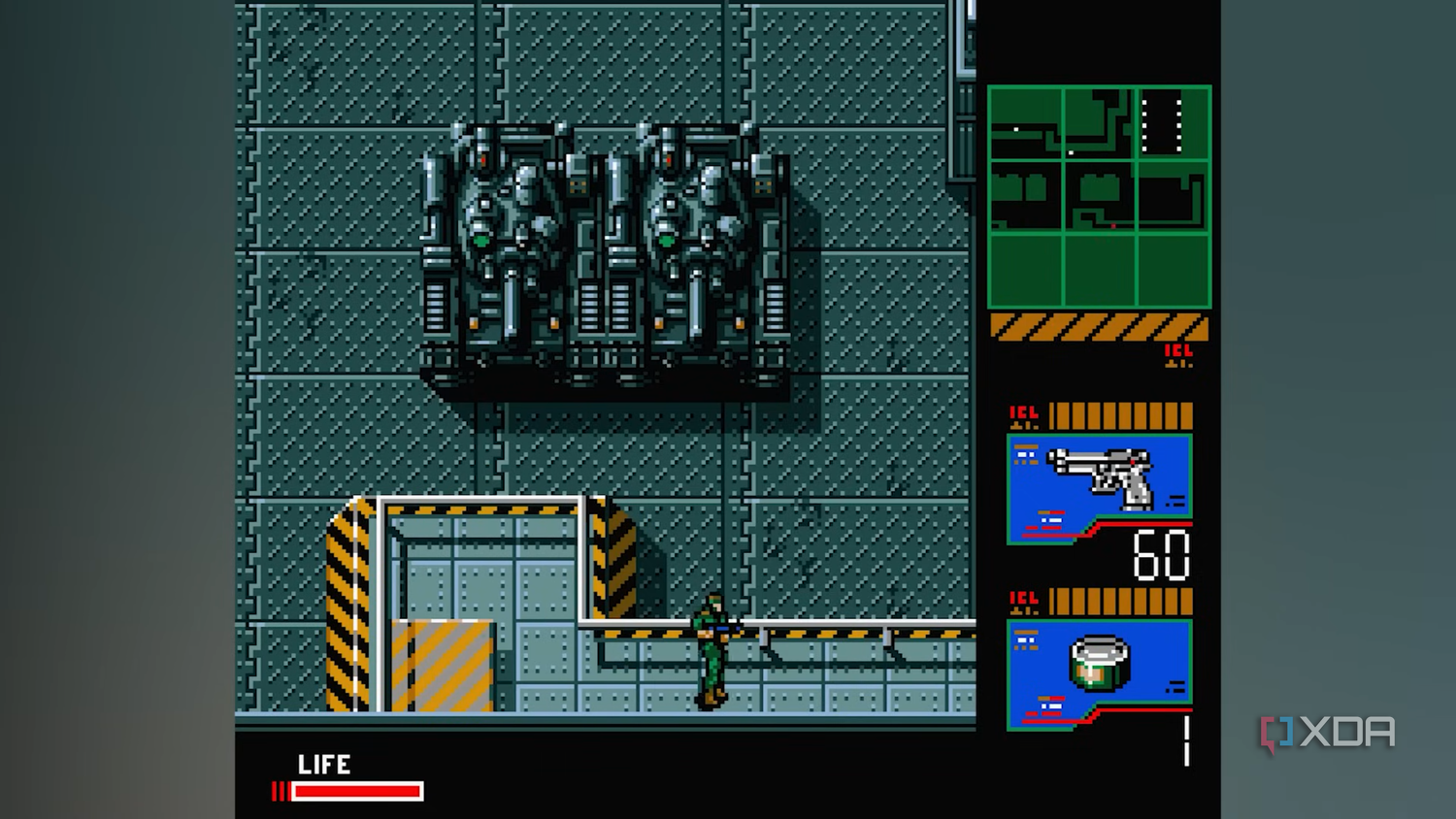 Snake walking next to two tanks in Metal Gear 2: Solid Snake.