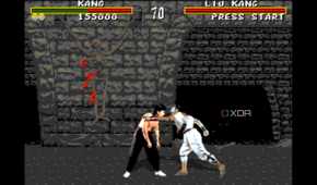 Liu Kang hitting Kano to draw blood in Mortal Kombat on the Sega Genesis.