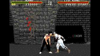 Liu Kang hitting Kano to draw blood in Mortal Kombat on the Sega Genesis.
