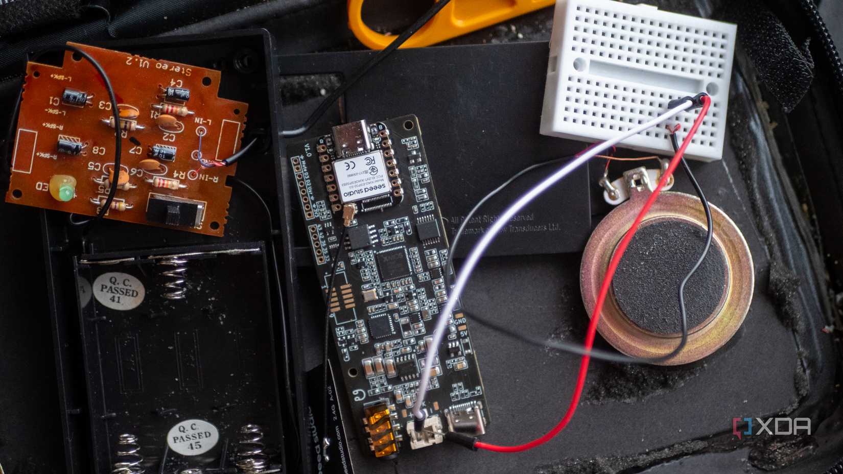 ReSpeaker Lite connected to a breadboard with wires to a speaker