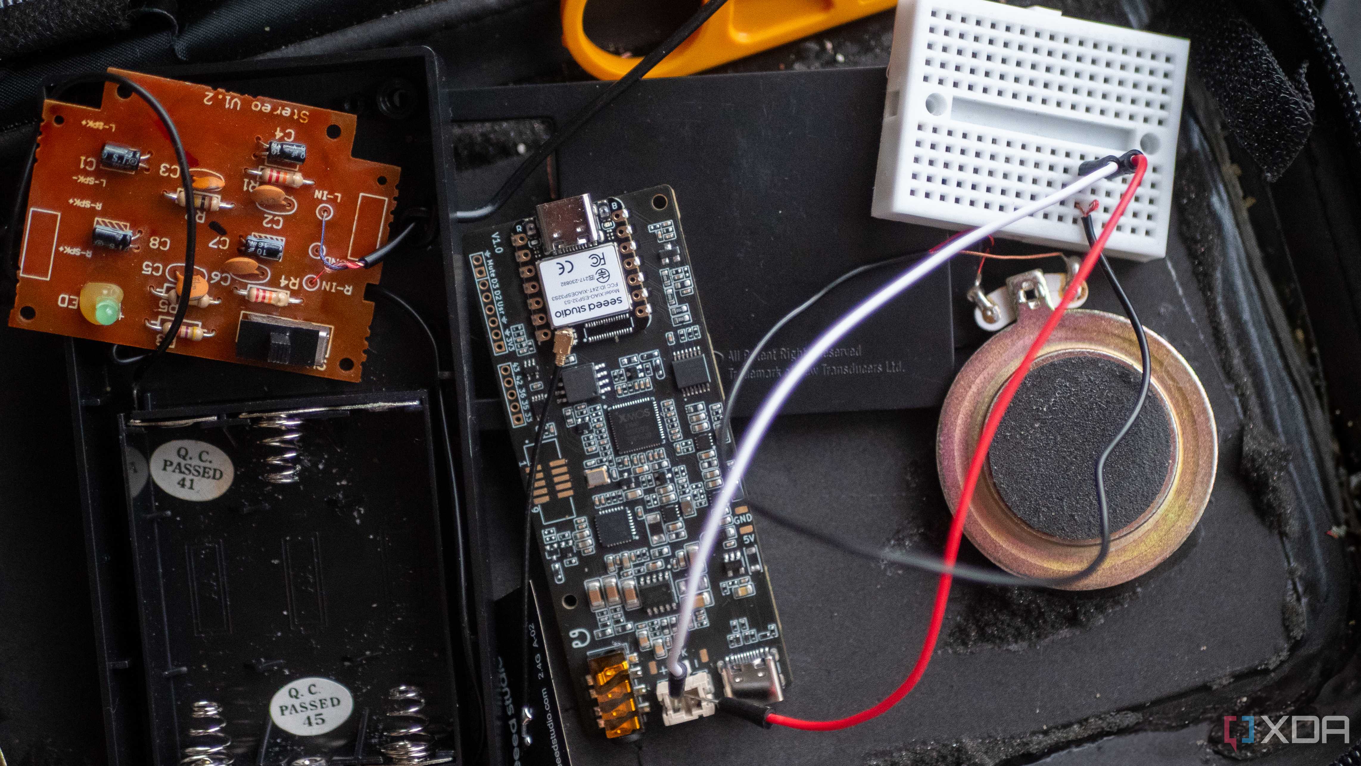 ReSpeaker Lite connected to a breadboard with wires to a speaker