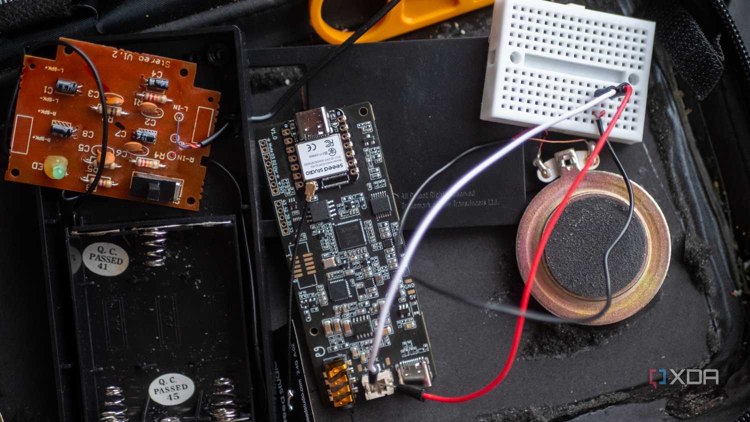 ReSpeaker Lite connected to a breadboard with wires to a speaker