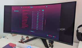 An ultrawide monitor showing the graphics settings of Cyberpunk 2077