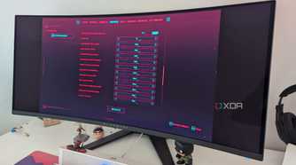 An ultrawide monitor showing the graphics settings of Cyberpunk 2077