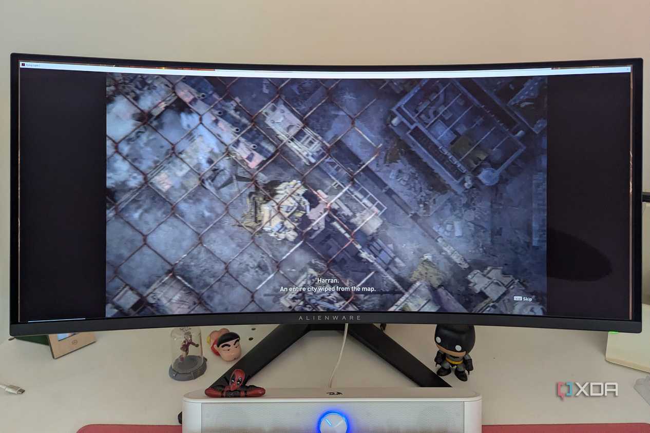 An ultrawide monitor playing a cutscene in Dying Light 2