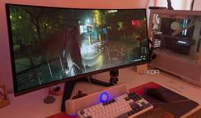 An ultrawide OLED monitor playing Alan Wake 2