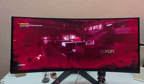 An ultrawide OLED monitor playing Control