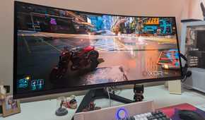 An image of an ultra-wide monitor running Cyberpunk 2077.