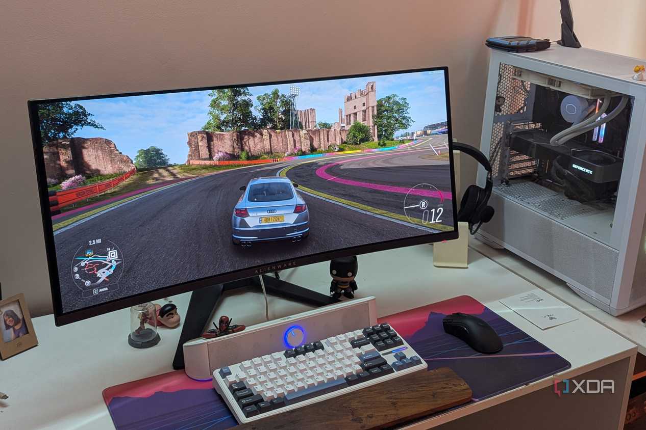 An ultrawide OLED monitor playing Forza Horizon 4