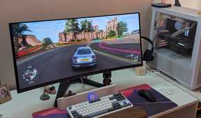 An ultrawide OLED monitor playing Forza Horizon 4