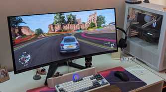 An ultrawide OLED monitor playing Forza Horizon 4