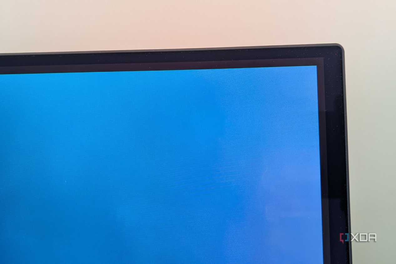 Close-up of a monitor screen showing gap between the image and the bezels