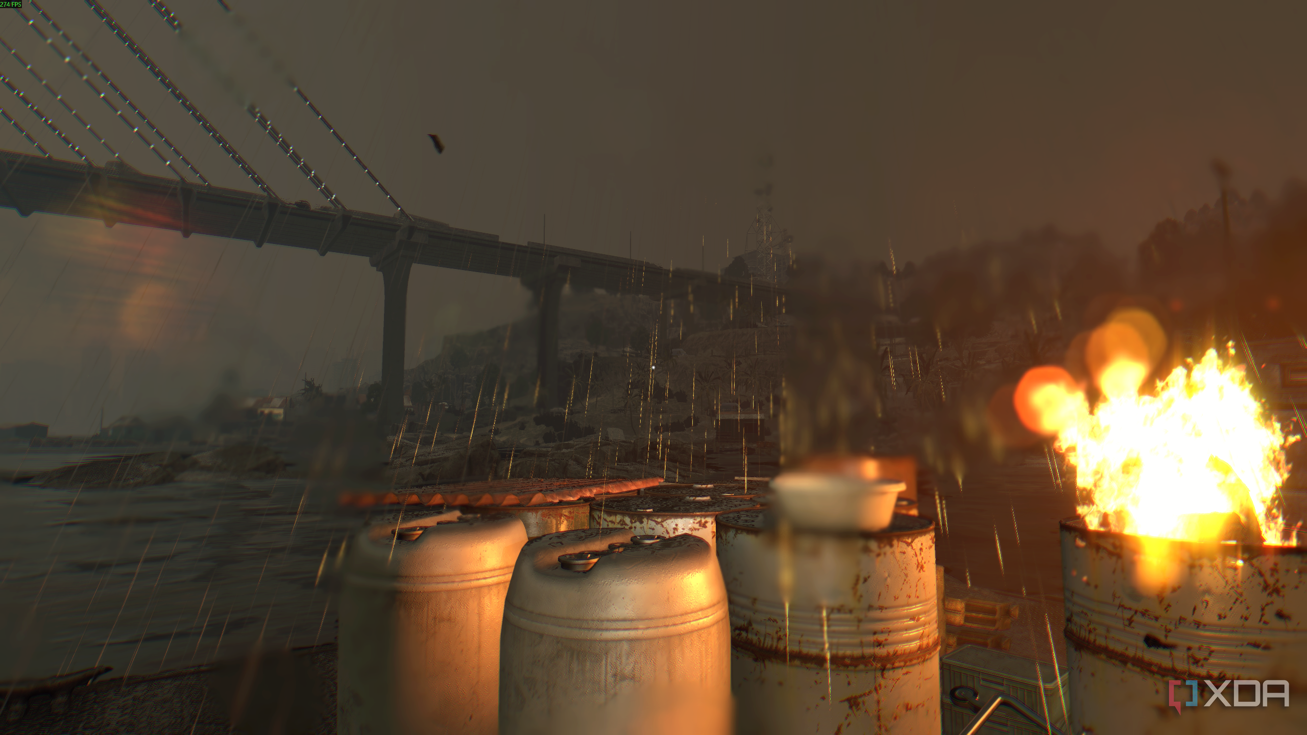 Night rain with a barrel on fire in Dying Light.