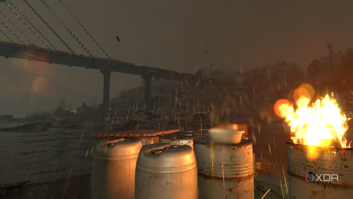Night rain with a barrel on fire in Dying Light.