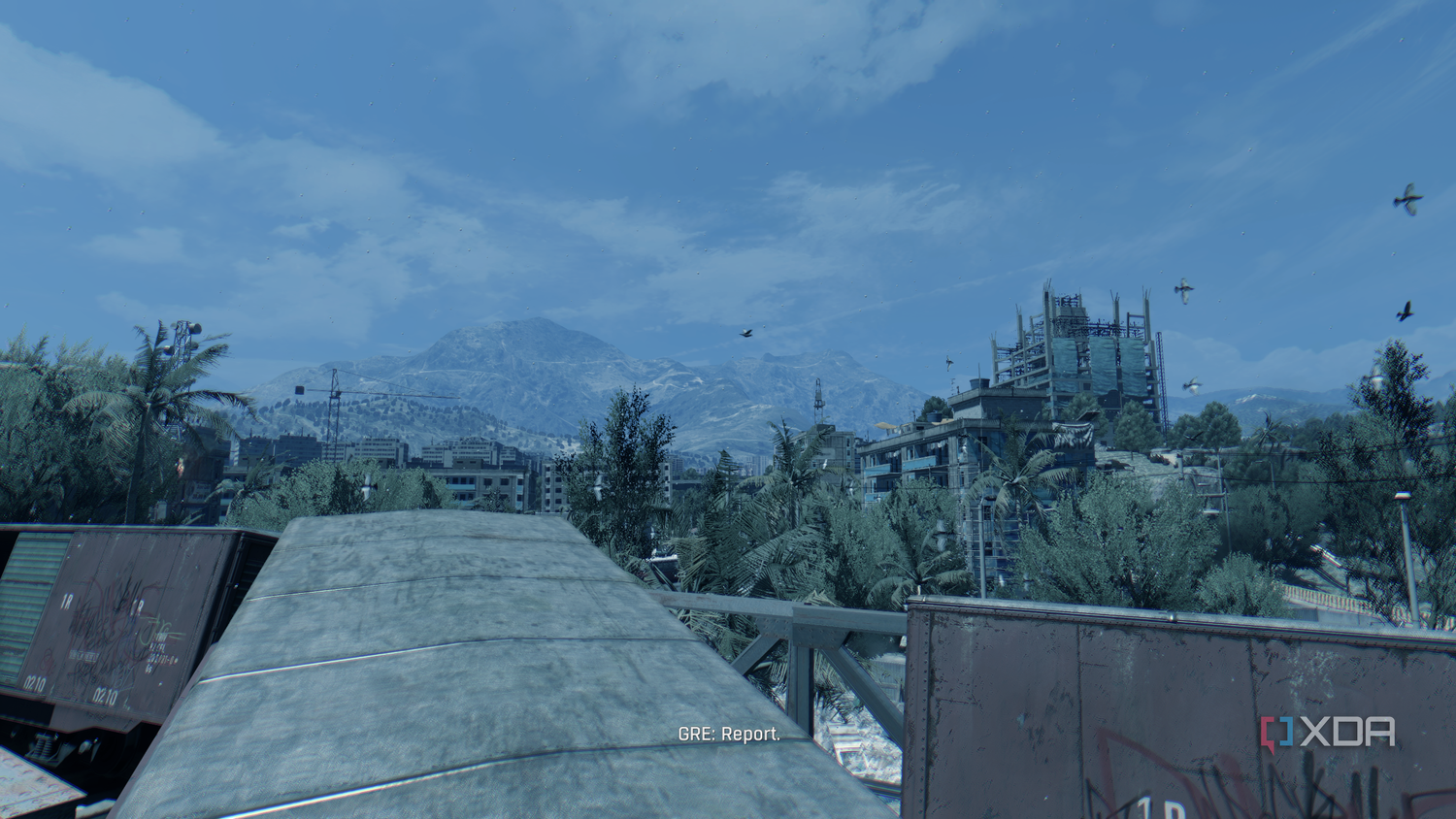 Standing on top of a derailed train in Dying Light.