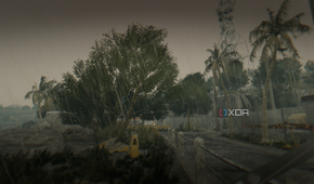 The city of Harran covered in pouring rain during daytime in Dying Light.