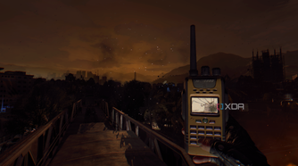 Holding a radio at night in Dying Light.