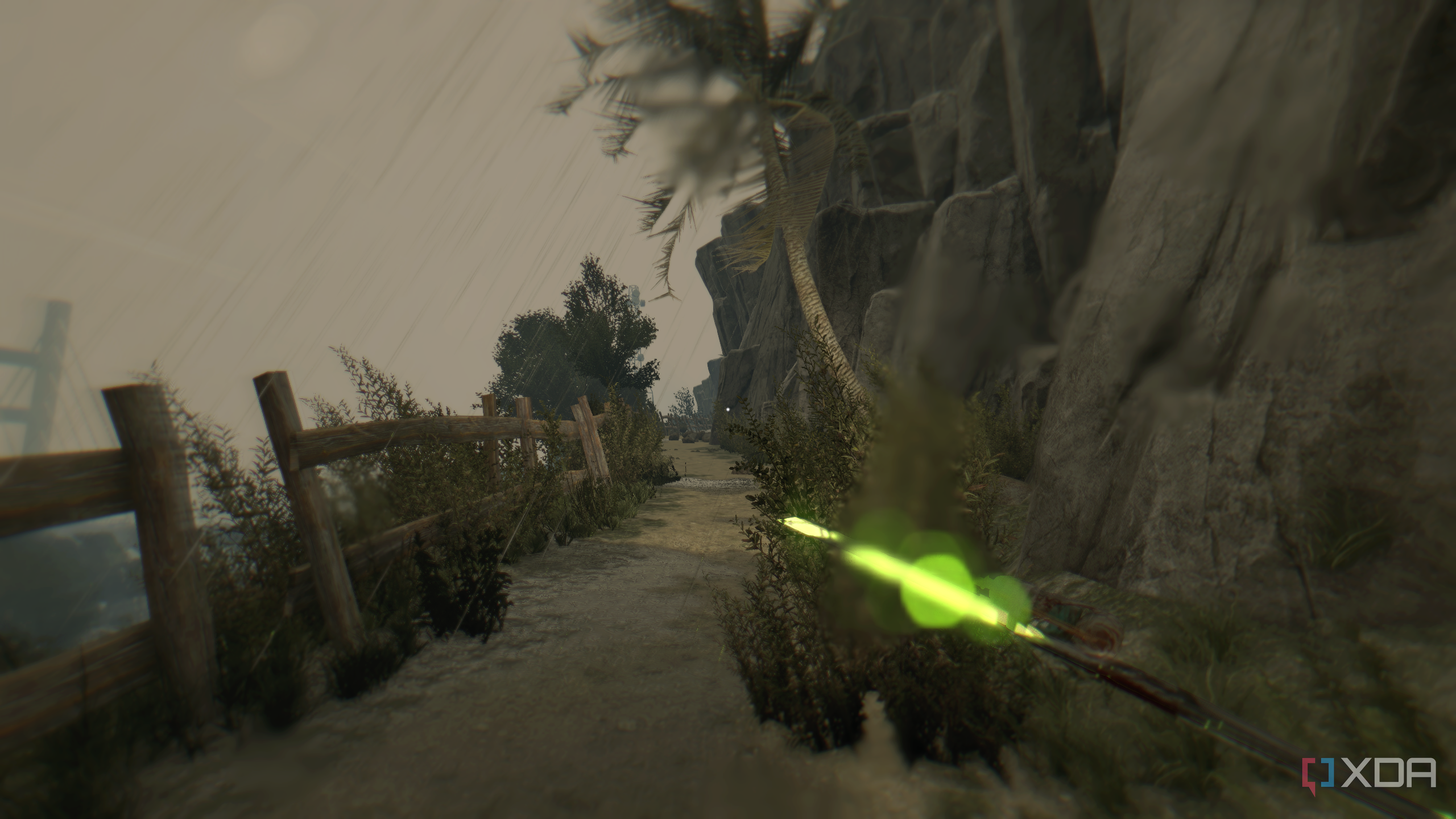 Running on a dirt trail during rain in Dying Light.