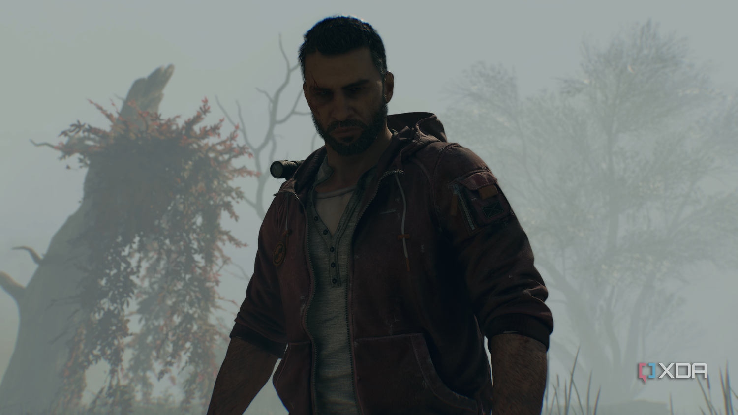 Kyle Crane on a misty island in Dying Light: The Beast.