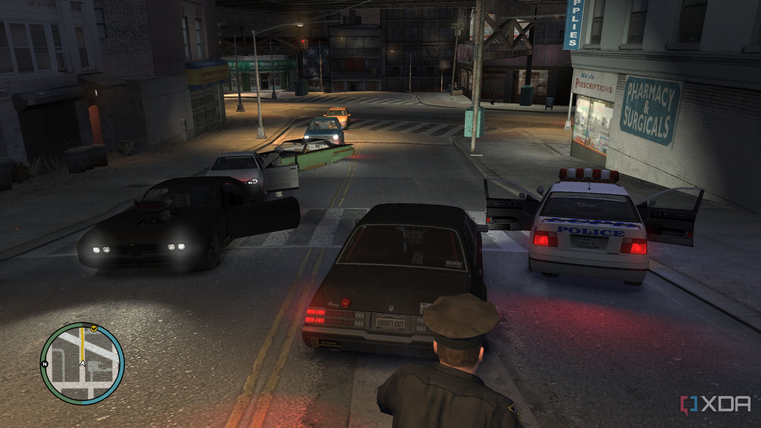 Driving past a police vehicle in GTA IV.