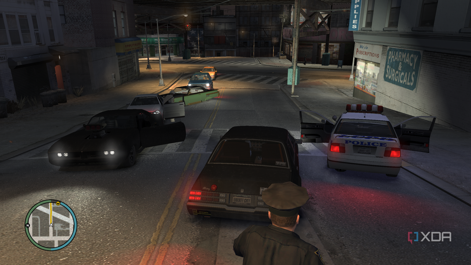 Driving past a police vehicle in GTA IV.