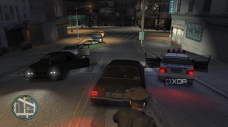 Driving past a police vehicle in GTA IV.