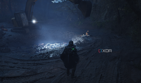 A man kneeling next to a pit of corpses in Hell is Us.