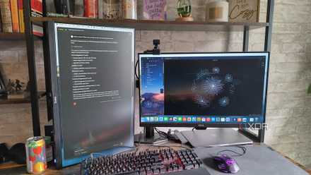 Image of a computer running both Claude and Obsidian.