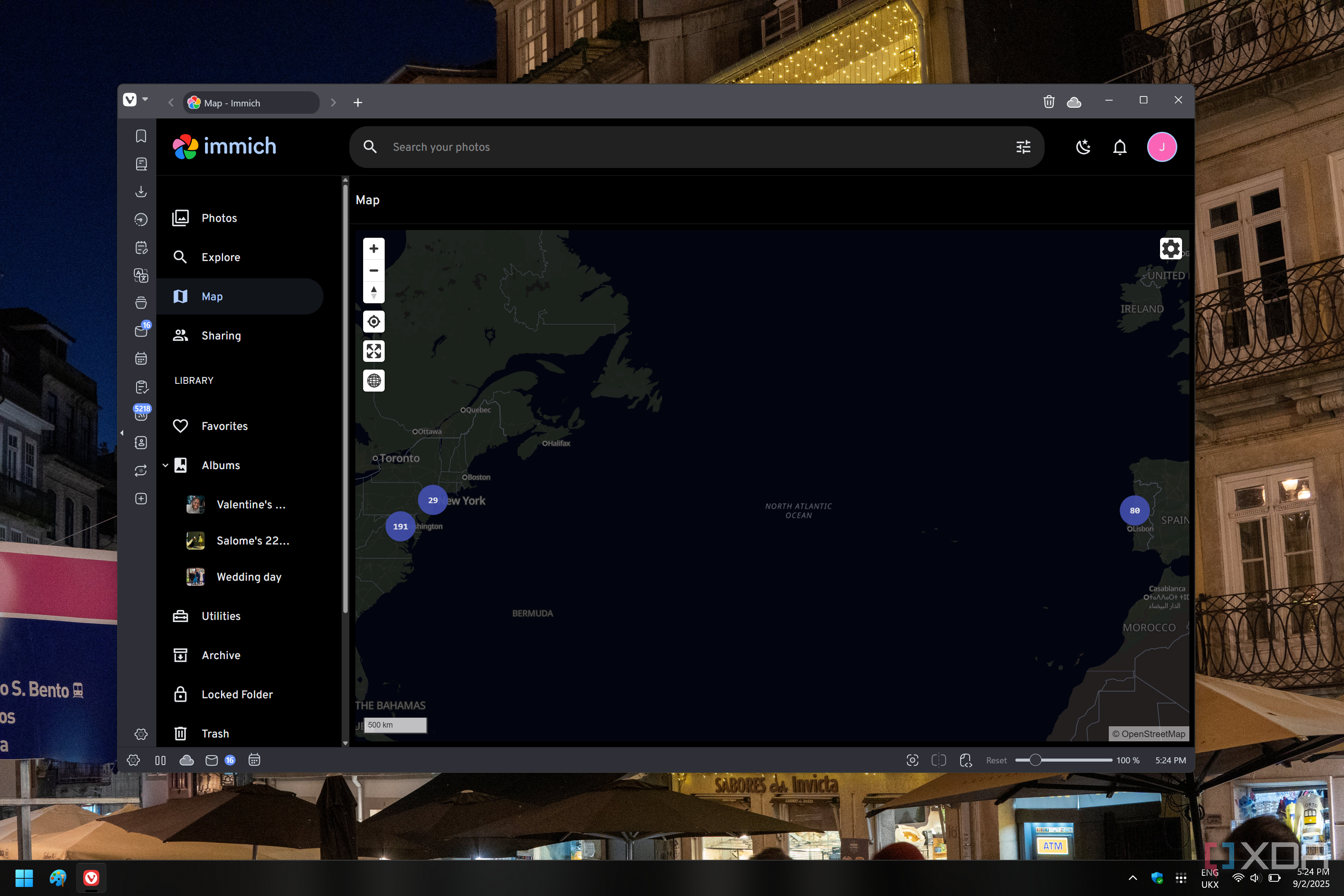 Screenshot of the map view in Immich showing a number photos taken in different places