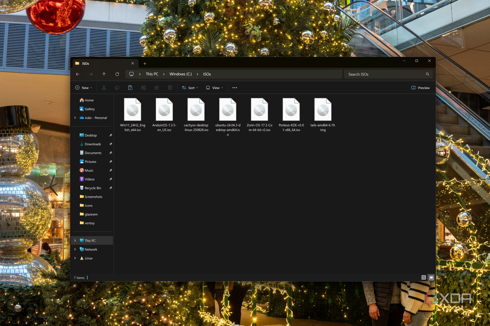 Screenshot of File Explorer opn Windows 11 showing various ISO files for operating systems