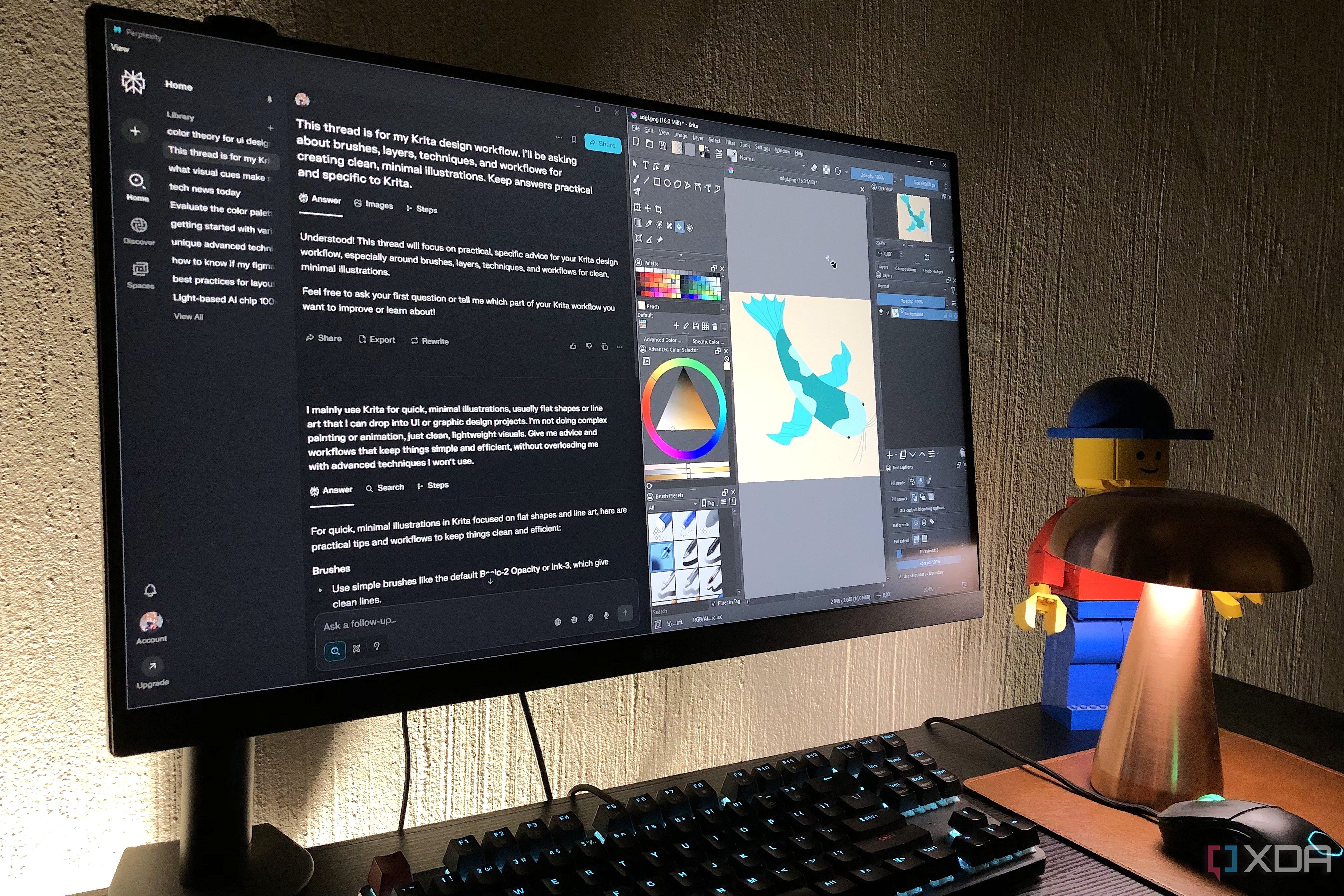Krita and Perplexity displayed on desktop pc, lamp and lego in view