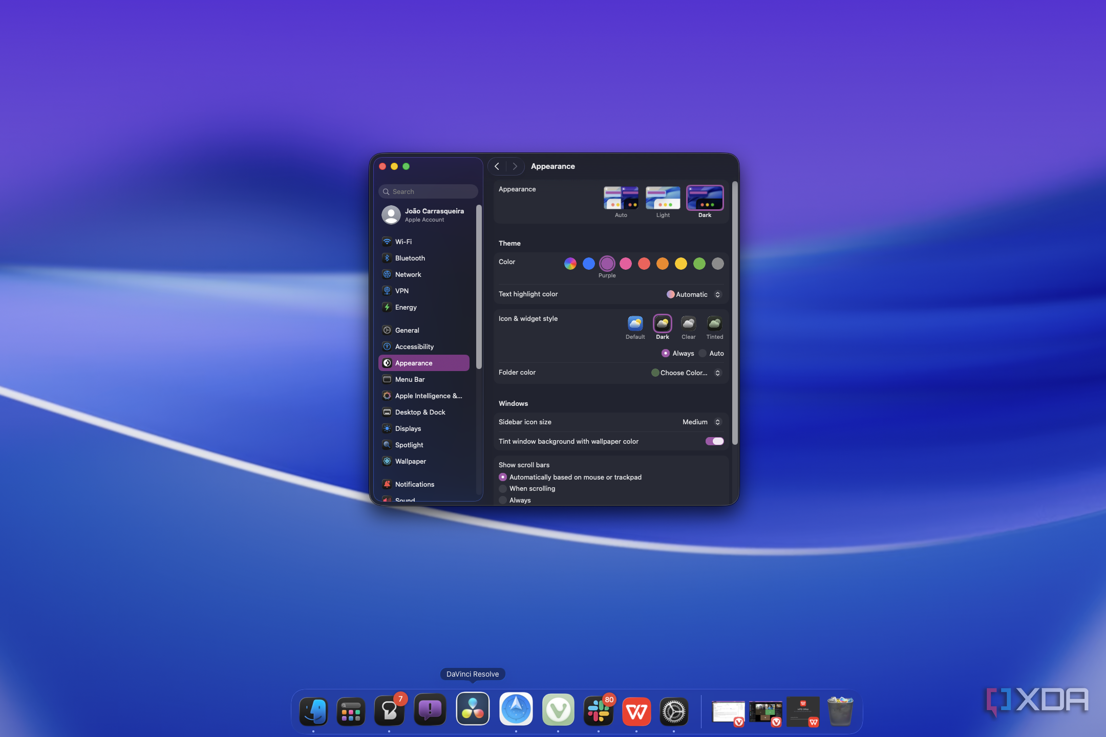 Screenshot of macOS cusotmization in dark mode with a purple accent and showing dark icons on the dock