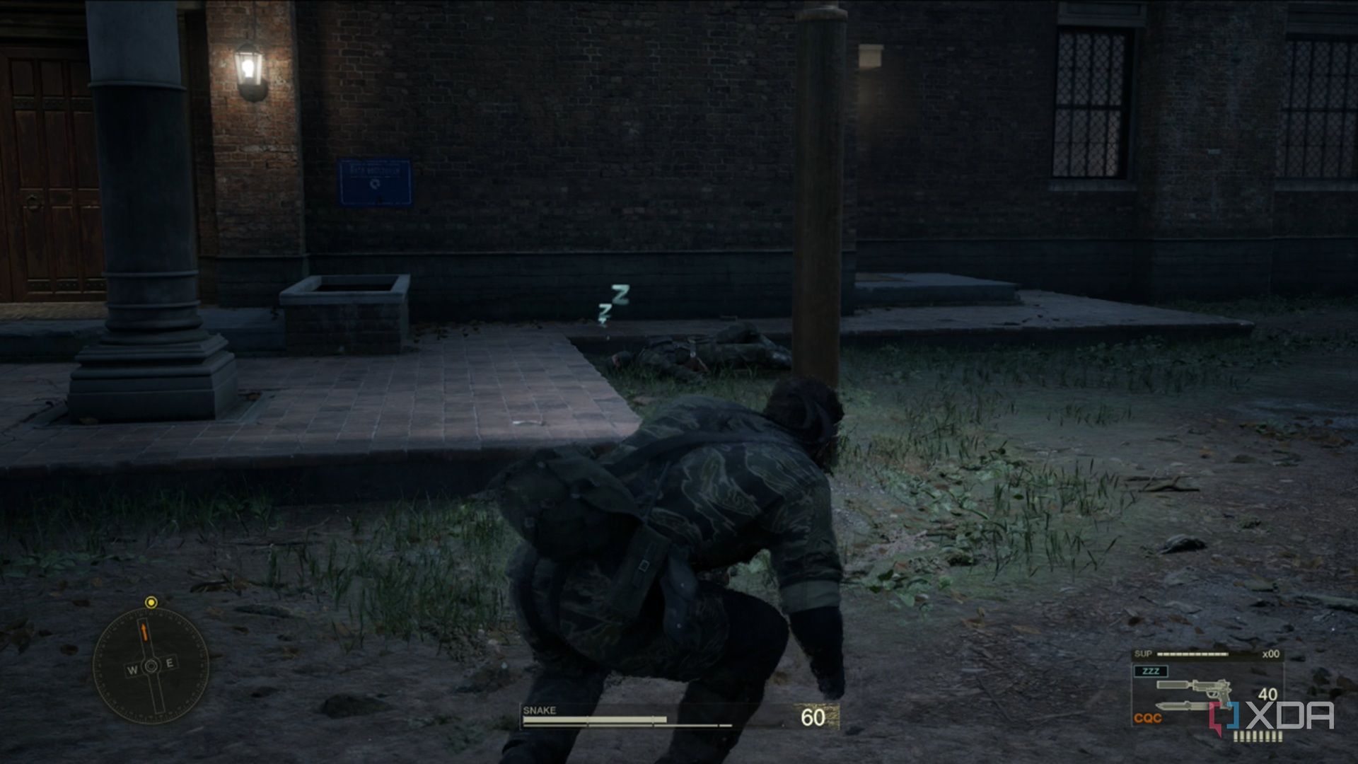 A screenshot of Snake sneaking around a downed guard in Metal Gear Solid Delta: Snake Eater