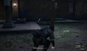 A screenshot of Snake sneaking around a downed guard in Metal Gear Solid Delta: Snake Eater