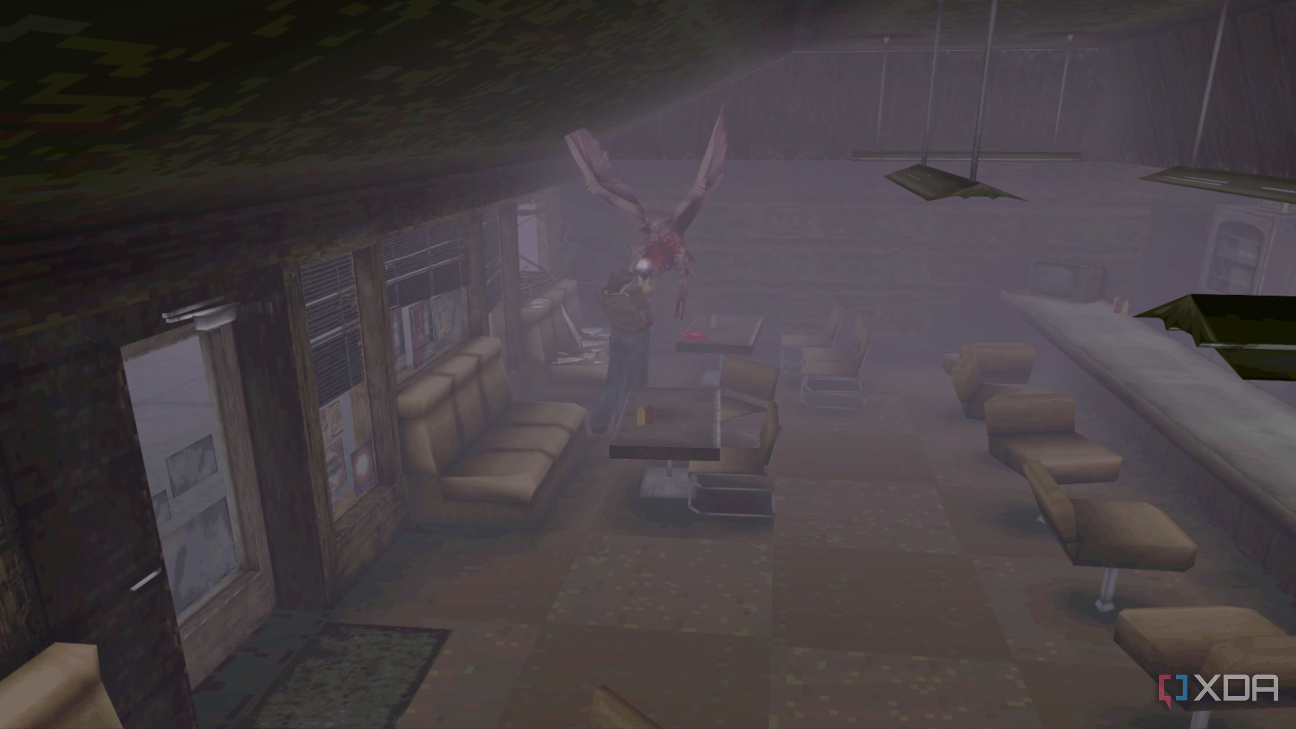 Fighting an air screamer in Silent Hill (1999).