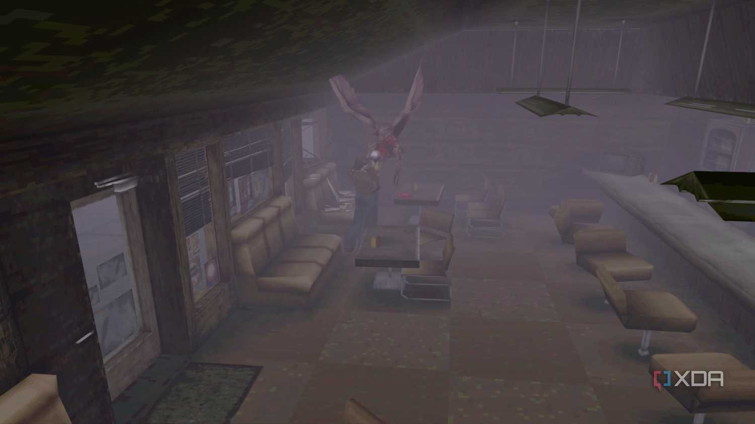 Fighting an air screamer in Silent Hill (1999).