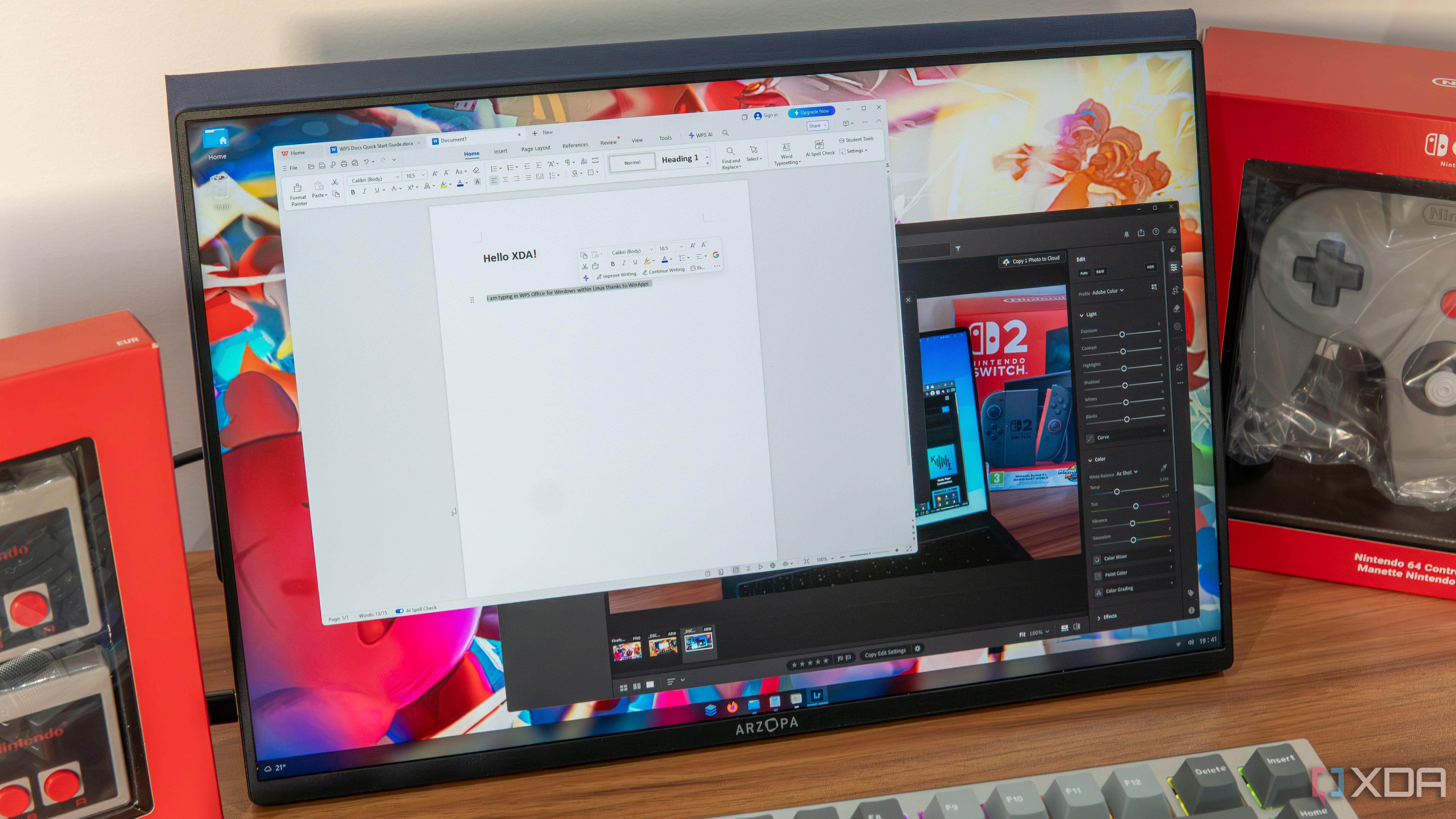 A monitor displaying an AnduinOS desktop with Windows apps running through WinApps