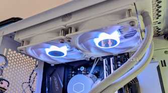 White AIO cooler fans spinning inside a gaming PC
